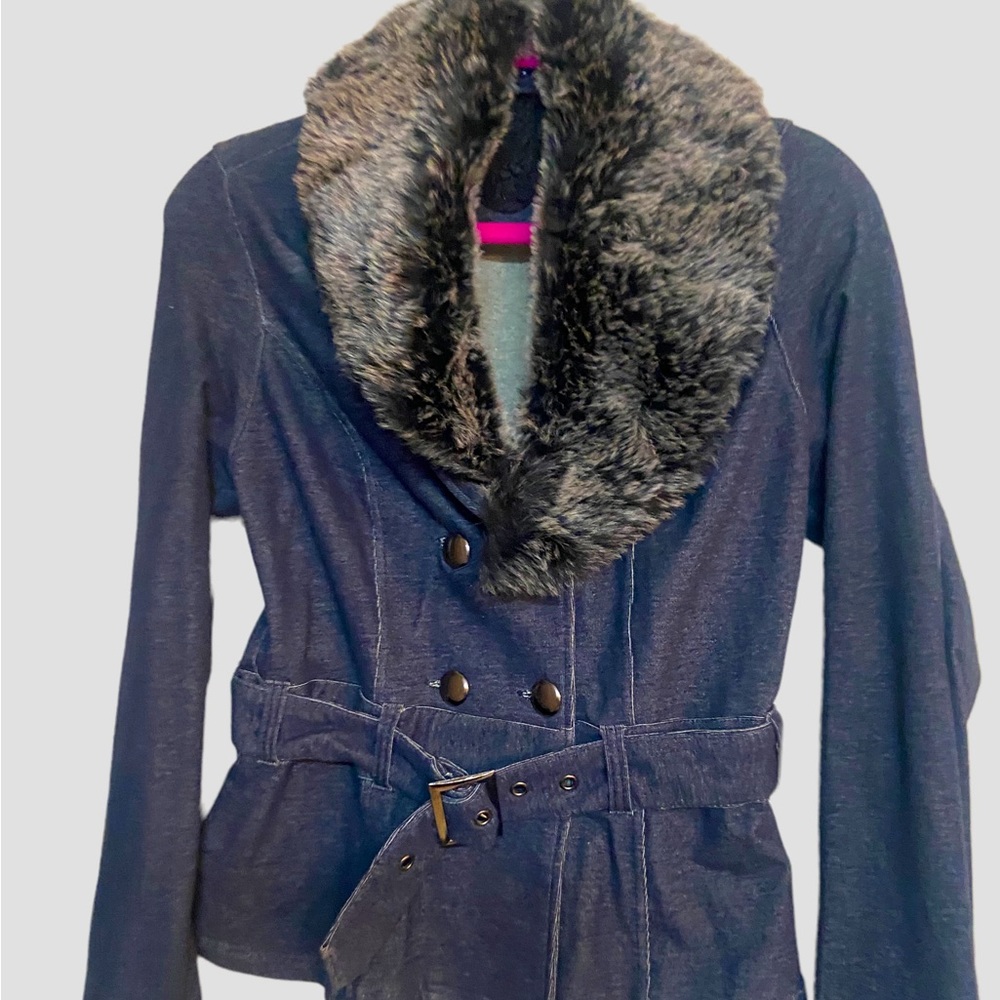 This jacket looks like denim but its cotton and spandex. Size L